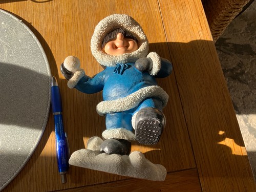 Eskimo figure snowballing - figure,